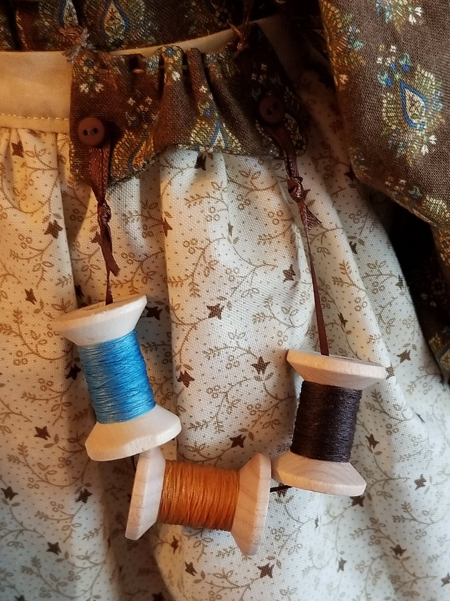 Handmade Annie doll with wooden spools. Limited Edition Series by Sunnie Andress