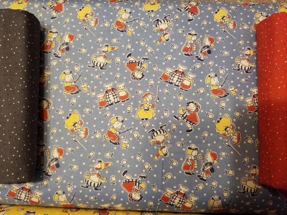 Story Time Mother Goose in Blue by Maywood Studio. Quilter's Cotton Fabric with vintage style for sewing. Continuous Cuts.