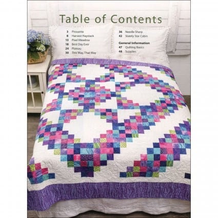 Charming Jelly Roll Quilts by Scott Flanagan for Annie's Quilting. A 48 page soft cover book with directions for 8 quilts plus 8 mini quilts