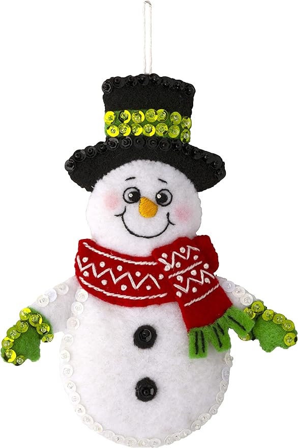 Snow Much Fun Felt Ornament kit by Bucilla. Easy to make 6 different beaded, sequined ornaments. Made in the USA