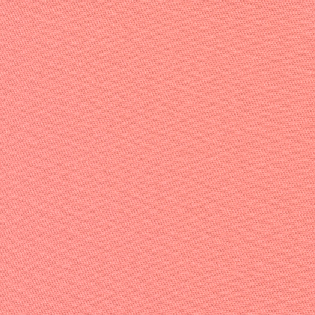 Bella Solids in Carnation by Moda. Continuous cuts of Quilter's Cotton Fabric