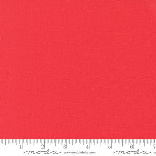Bella Solids in Geranium by Moda. Continuous cuts of Quilter's Cotton Fabric