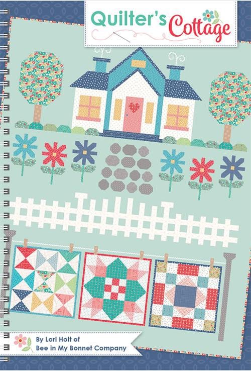 Quilter's Cottage 61 page soft cover spiral bound book by It's Sew Emma. Directions for 74.5 x 89 inch quilt and coordinating projects.