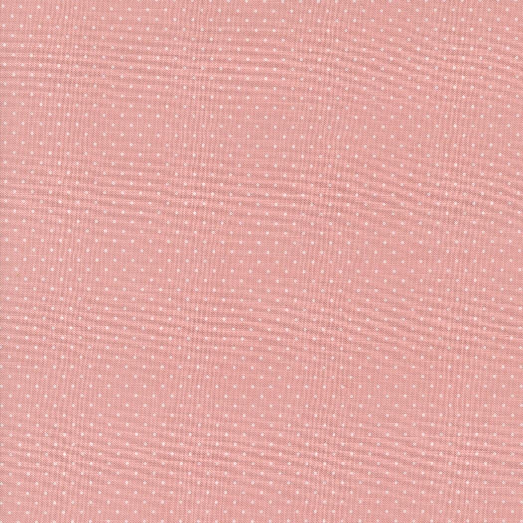 Enchantment Swiss Dot in Blush by Jackie MacDonald of Sweetfire Road for Moda. Continuous cuts of Quilter's Cotton