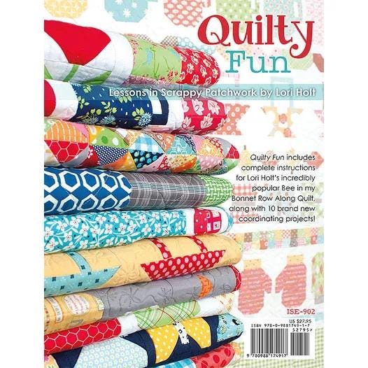 Quilty Fun 116 page soft cover spiral bound book by It's Sew Emma. Directions for Row Along Quilt and 10 coordinating projects.