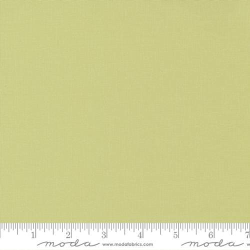 Bella Solids in Celery by Moda. Continuous cuts of Quilter's Cotton Fabric