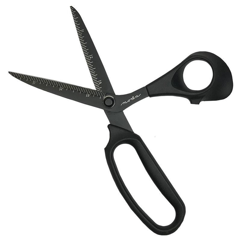 9 inch light weight scissors with comfort grip handles and ruler on nonstick Teflon coated blades. Teflon DressMaker Scissors 9 inch