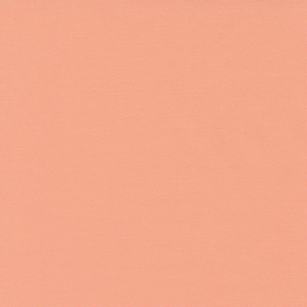 Bella Solids in Peach by Moda. Continuous cuts of Quilter's Cotton Fabric