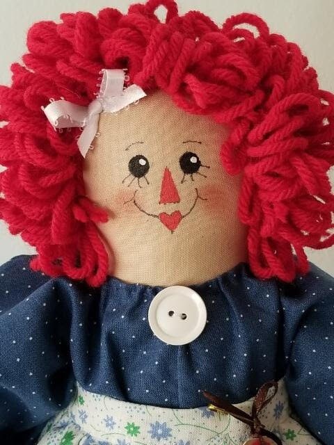 Handmade Annie doll with blue quilt. Limited Edition Series by Sunnie Andress