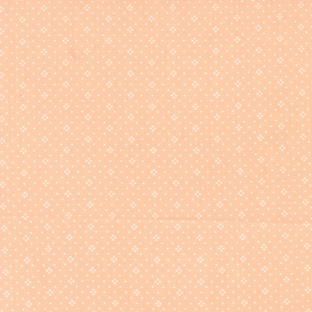 Eyelet in Cantaloupe by Fig Tree & Co for Moda Fabrics Basic Dot Foulard Shirting. Continuous cuts of Quilter's Cotton Fabric