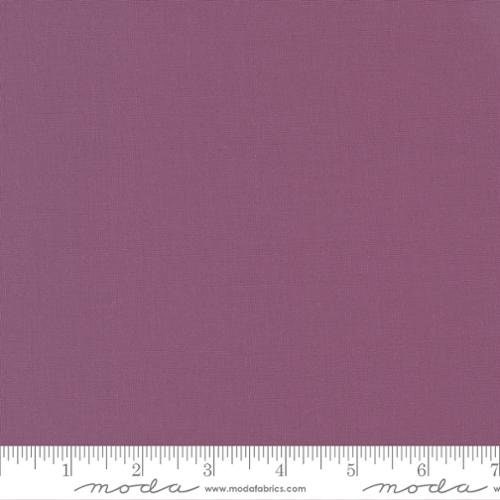 Bella Solids in Plum by Moda. Continuous cuts of Quilter's Cotton Fabric