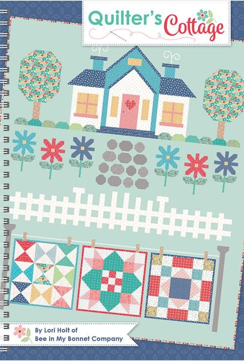 Quilter's Cottage 61 page soft cover spiral bound book by It's Sew Emma.  Directions for 74.5 x 89 inch quilt and coordinating projects.