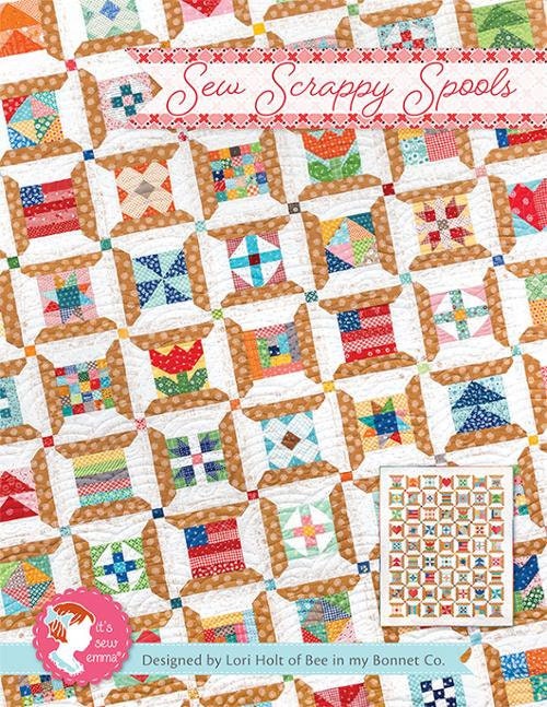 Sew Scrappy Spools pattern by It's Sew Emma. Directions for 14 scrappy blocks to create a 72.5 inch x 90.5 inch quilt.