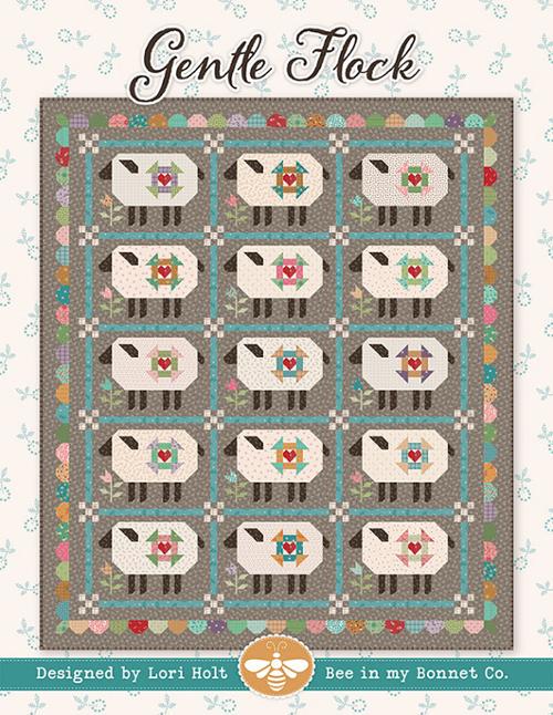 Gentle Flock pattern by It's Sew Emma.  Directions for a 71.5" x 83.5" inch quilt featuring charming sheep with churn dash blocks.