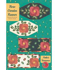 Rose Garden Table Runner Pattern by Heather Peterson of Anka's Treasures . 30" x 59" and 29" x 62.75" oversized runners