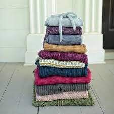 Grown by Kate Oates 104 page soft cover book by NNK Press with 10 different raglan sleeve sweater patterns and instructions for adults