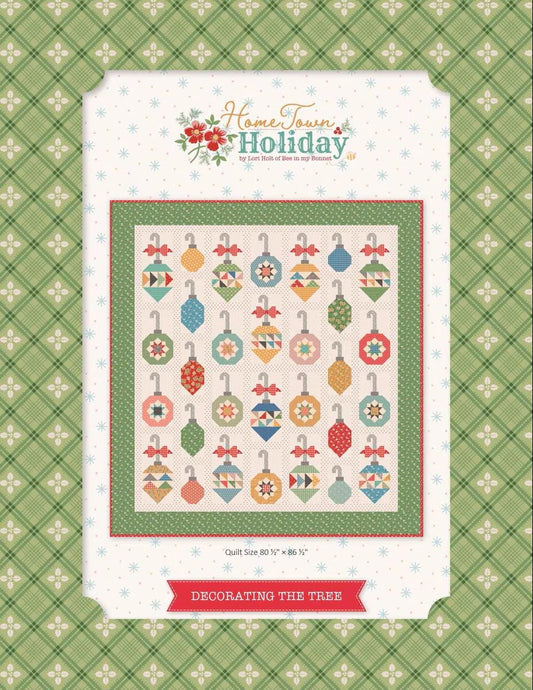 Decorating the Tree pattern by Lori Holt of It's Sew Emma.  Traditionally pieced blocks of Christmas ornaments. Quilt size 80 1/2" x 86 1/2"