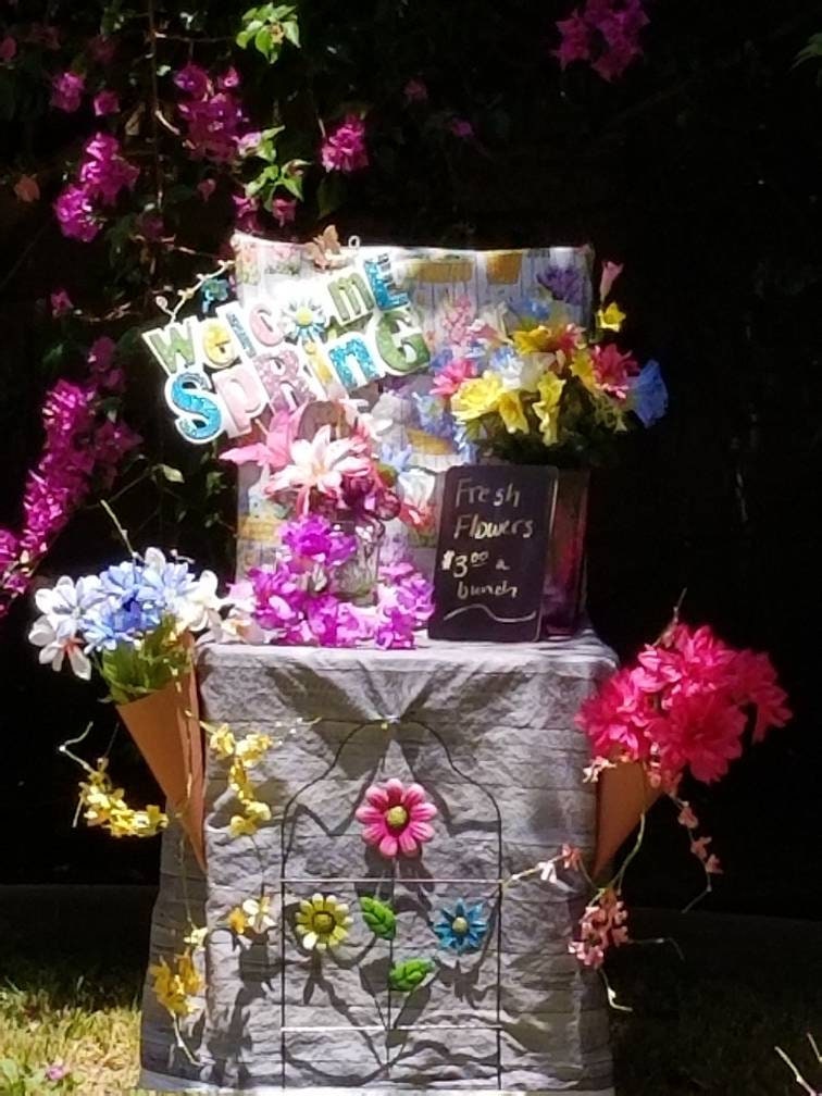 Flower Stand Chair Cover for make believe play with flowers, vase, plastic Mason jar, signs, and chalk board.