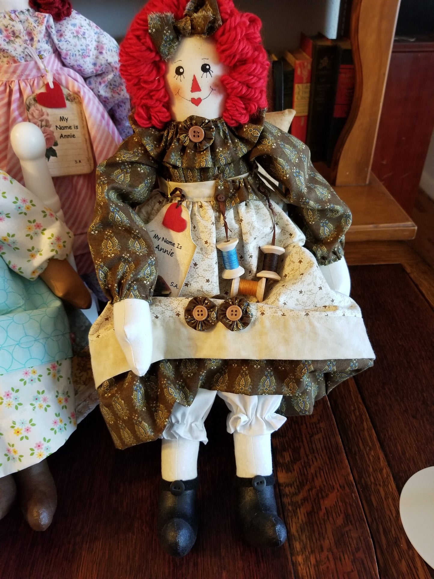 Handmade Annie doll with wooden spools. Limited Edition Series by Sunnie Andress