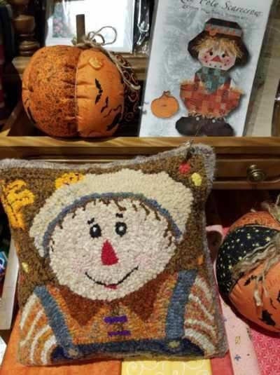 Scarecrow Pillow rug hooked in wool/wool blend on monks cloth. Original, one of a kind design by Sunnie Andress