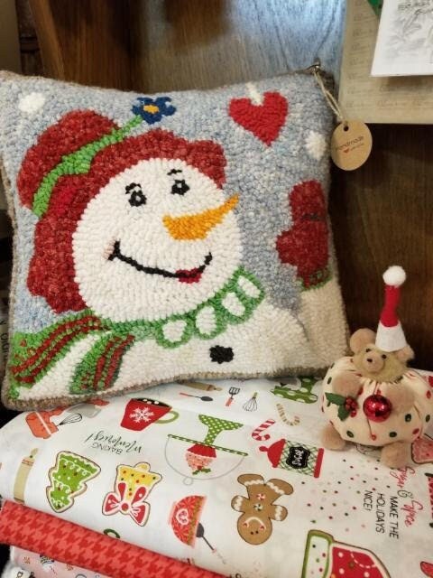 Snowwoman Pillow rug hooked in wool/wool blend on monks cloth. Original, one of a kind design by Sunnie Andress