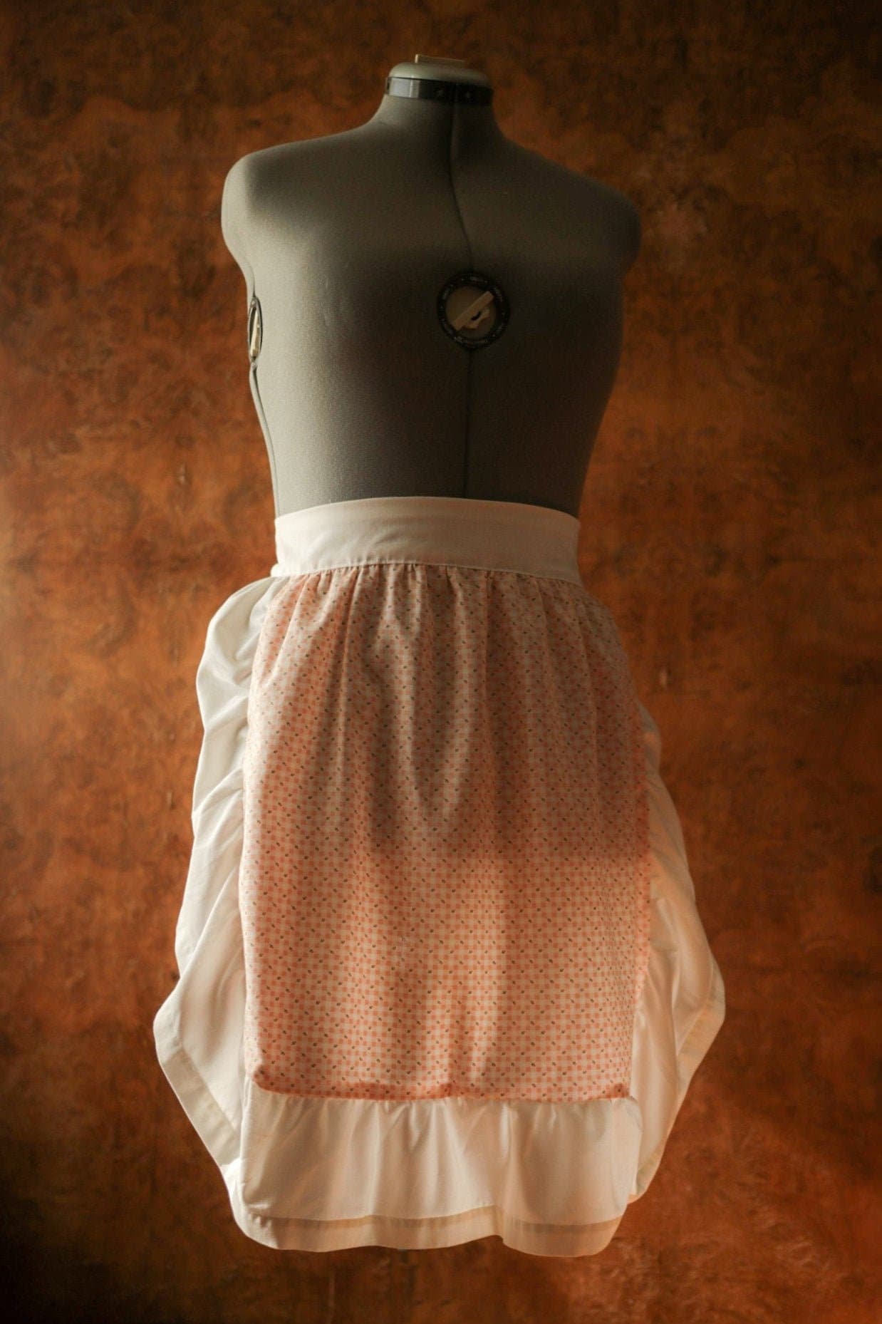Soft vintage fabrics handcrafted into a delightfully sweet apron.
