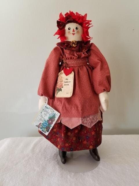 Handmade Annie doll with Country Garden book. Limited Edition Series by Sunnie Andress