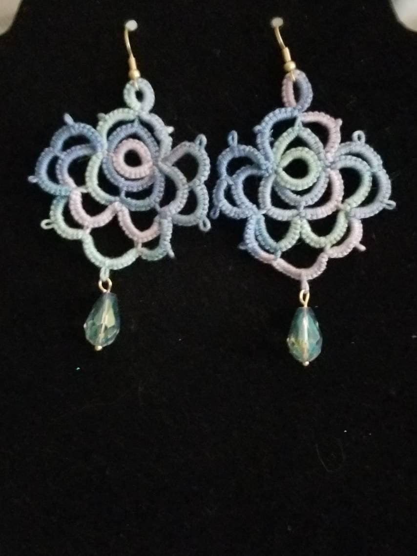 Tatted Lace Drop Earrings in Rose Pattern with blue/green/purple variegated rose and iridescent green drop bead.