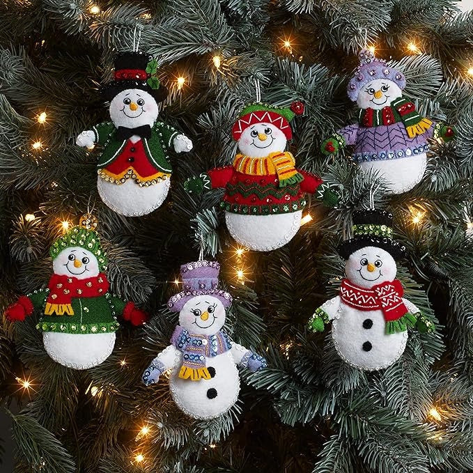 Snow Much Fun Felt Ornament kit by Bucilla. Easy to make 6 different beaded, sequined ornaments. Made in the USA